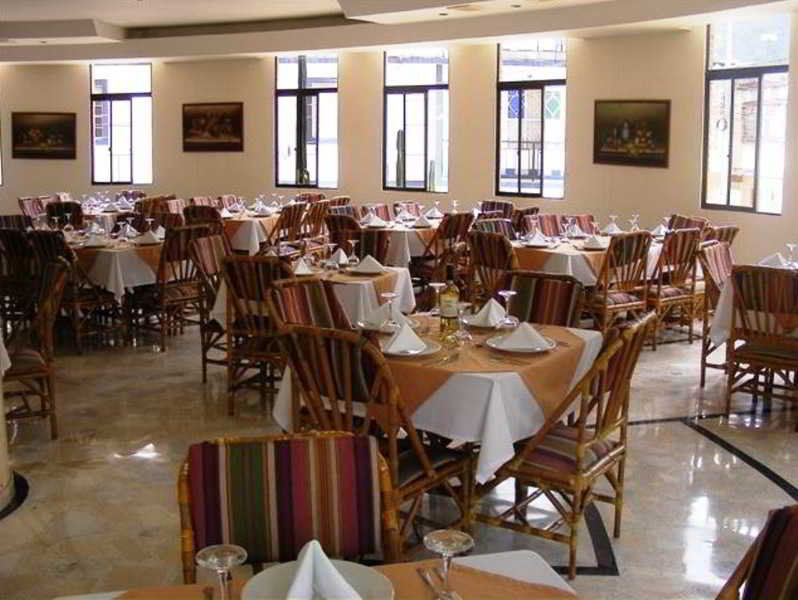 Casa Morales Hotel Internacional Y Centro De Convenciones Ibagué Exterior foto The dining room at the hotel