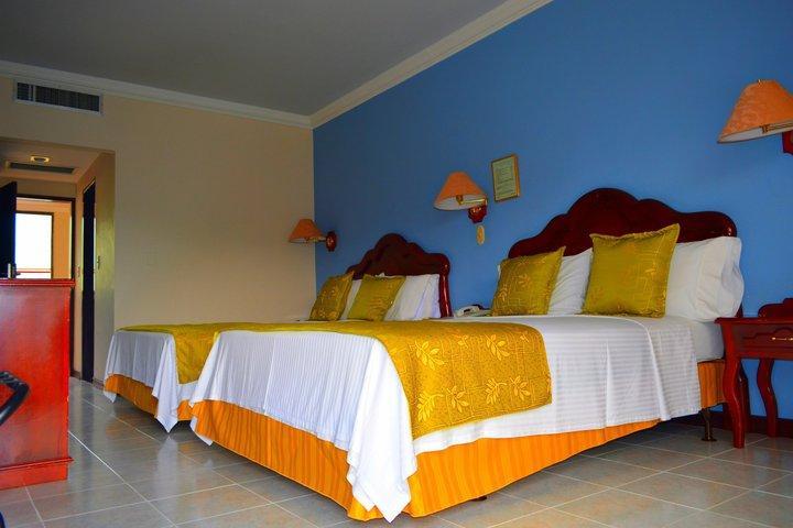 Casa Morales Hotel Internacional Y Centro De Convenciones Ibagué Exterior foto A room at the hotel